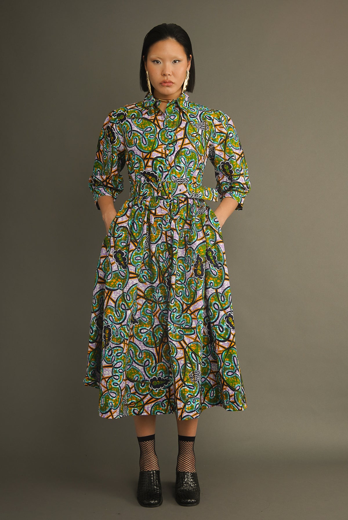 Close-up of the button-down collar and three-quarter sleeves on the Green Vine Shirt Dress