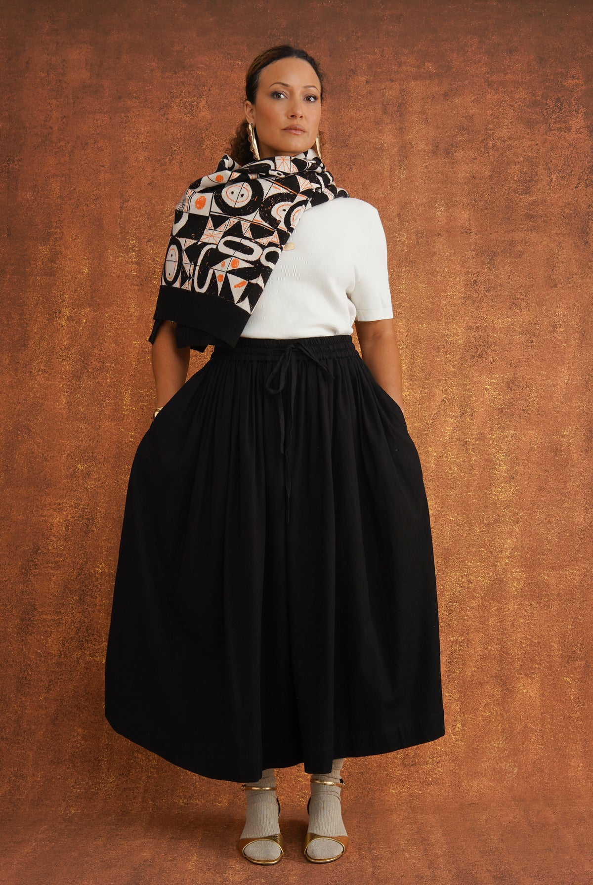 The Grand Skirt in Black, gathered midi skirt in textured dobby cotton with elasticated drawstring waist