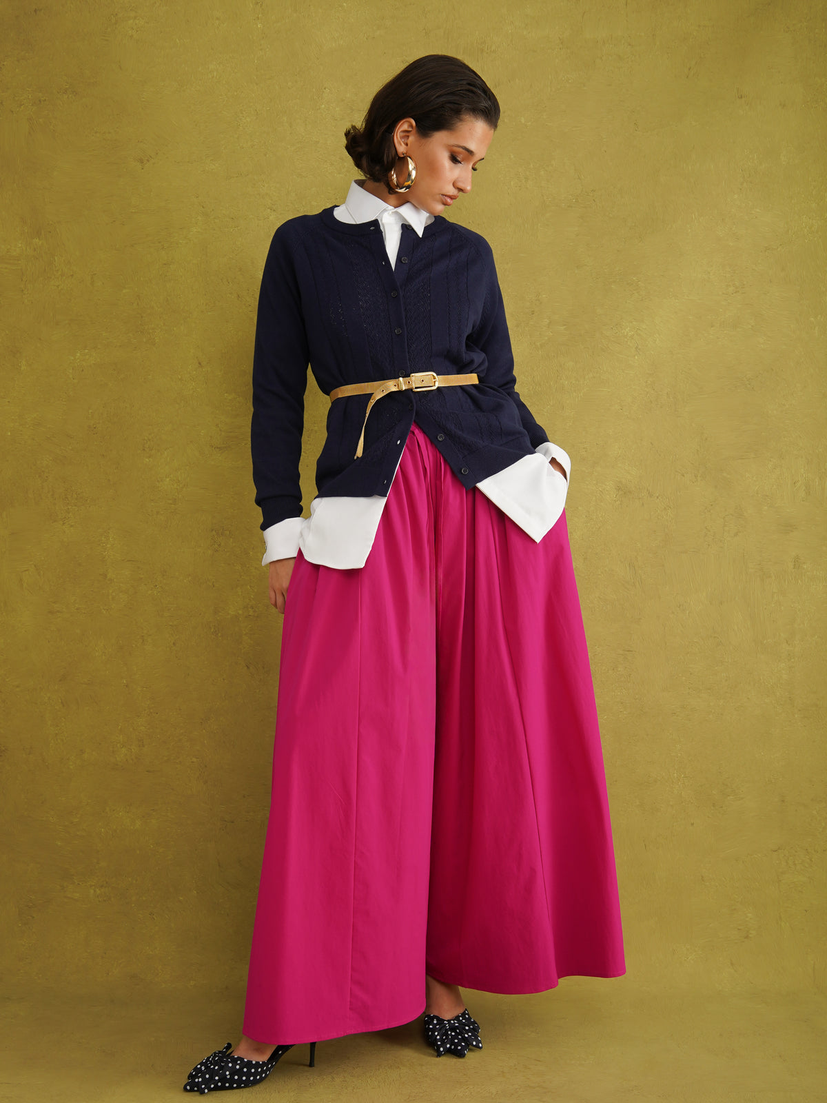 Titi Cardigan in Navy, a relaxed-fit navy knit cardigan with open-work and cable stitches and small buttons up to the neck