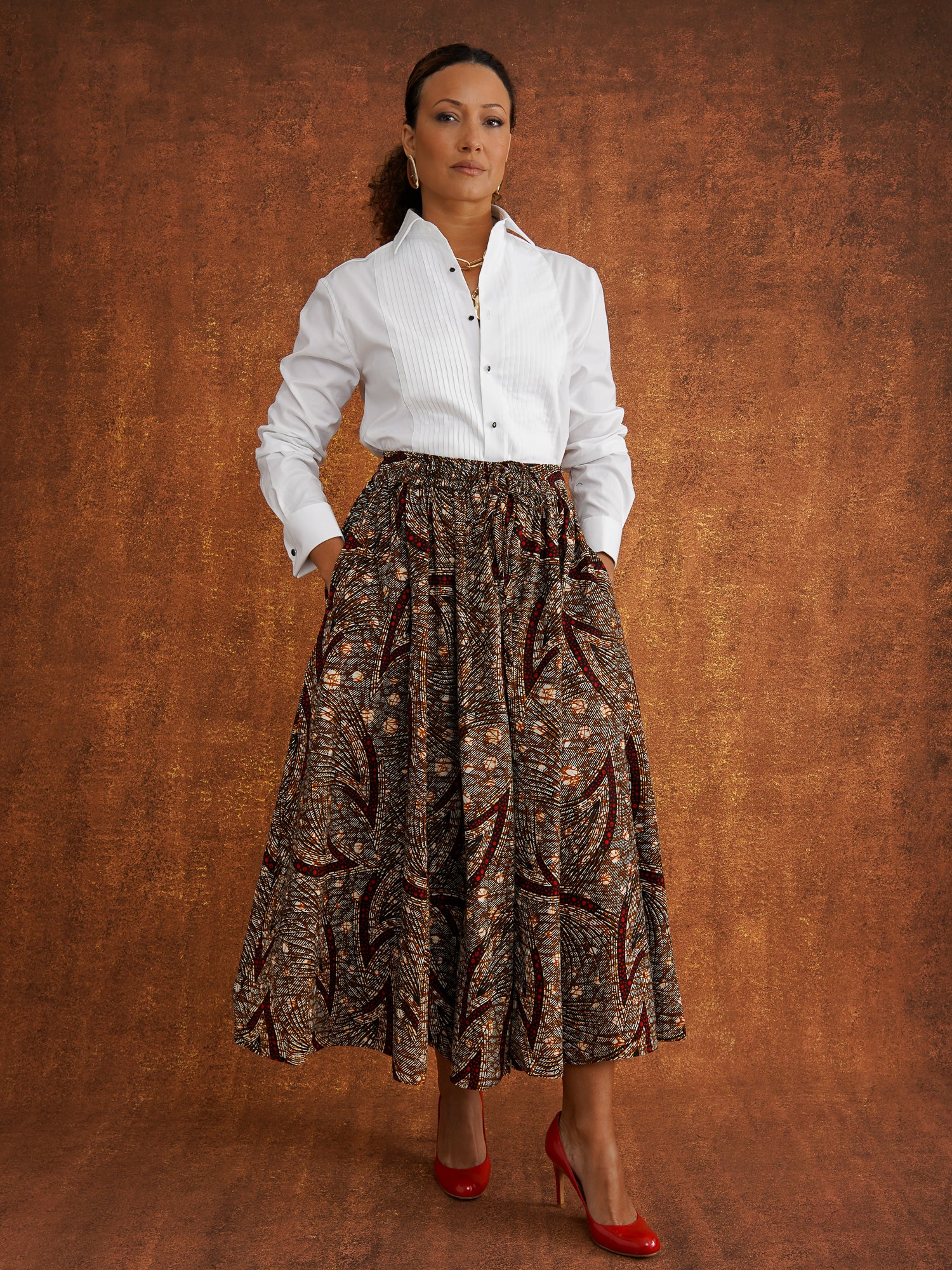 Chinaza printed cotton midi skirt worn with a white shirt, showing the full silhouette