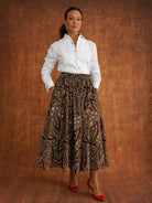 Chinaza printed cotton midi skirt worn with a white shirt, showing the full silhouette