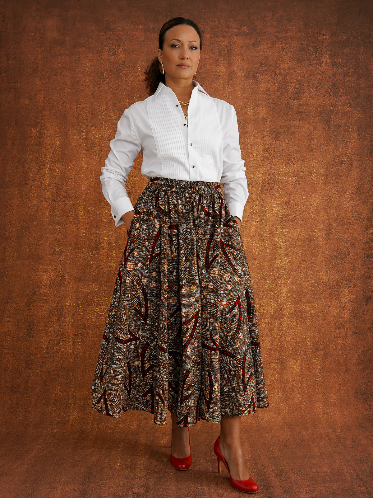 Chinaza printed cotton midi skirt worn with a white shirt, showing the full silhouette