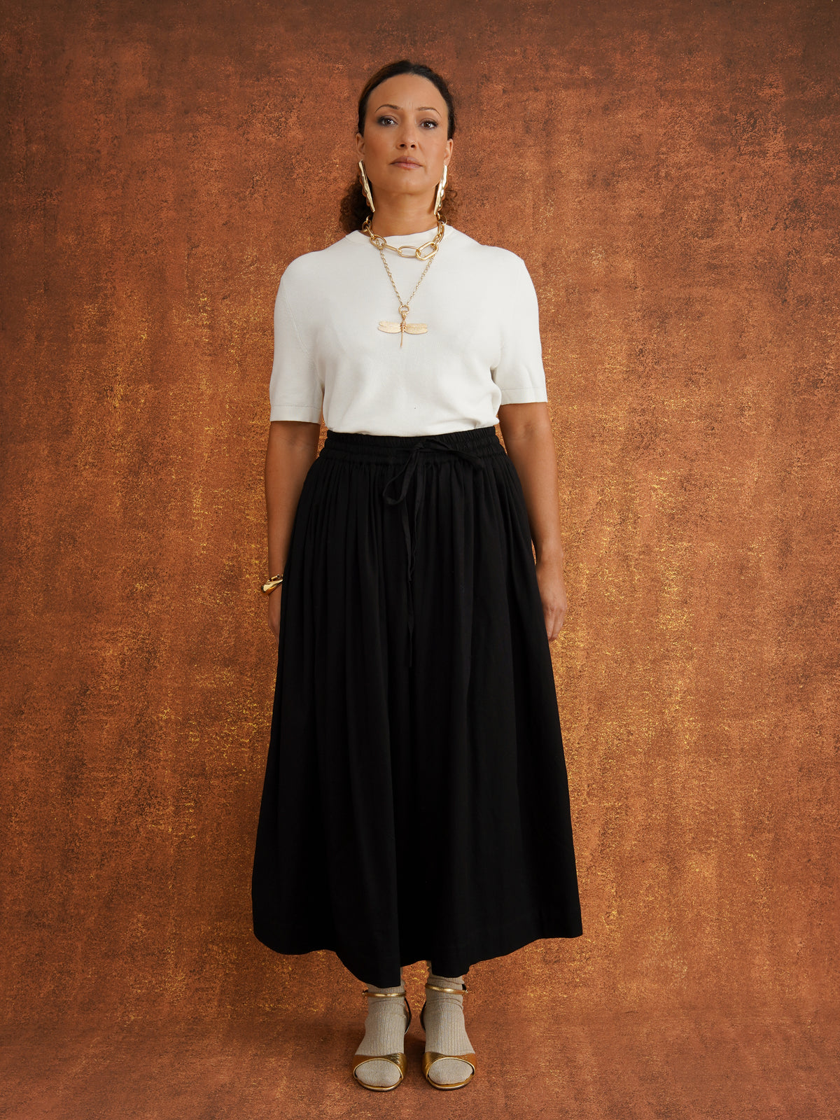 The Grand Skirt in Black, gathered midi skirt in textured dobby cotton with elasticated drawstring waist