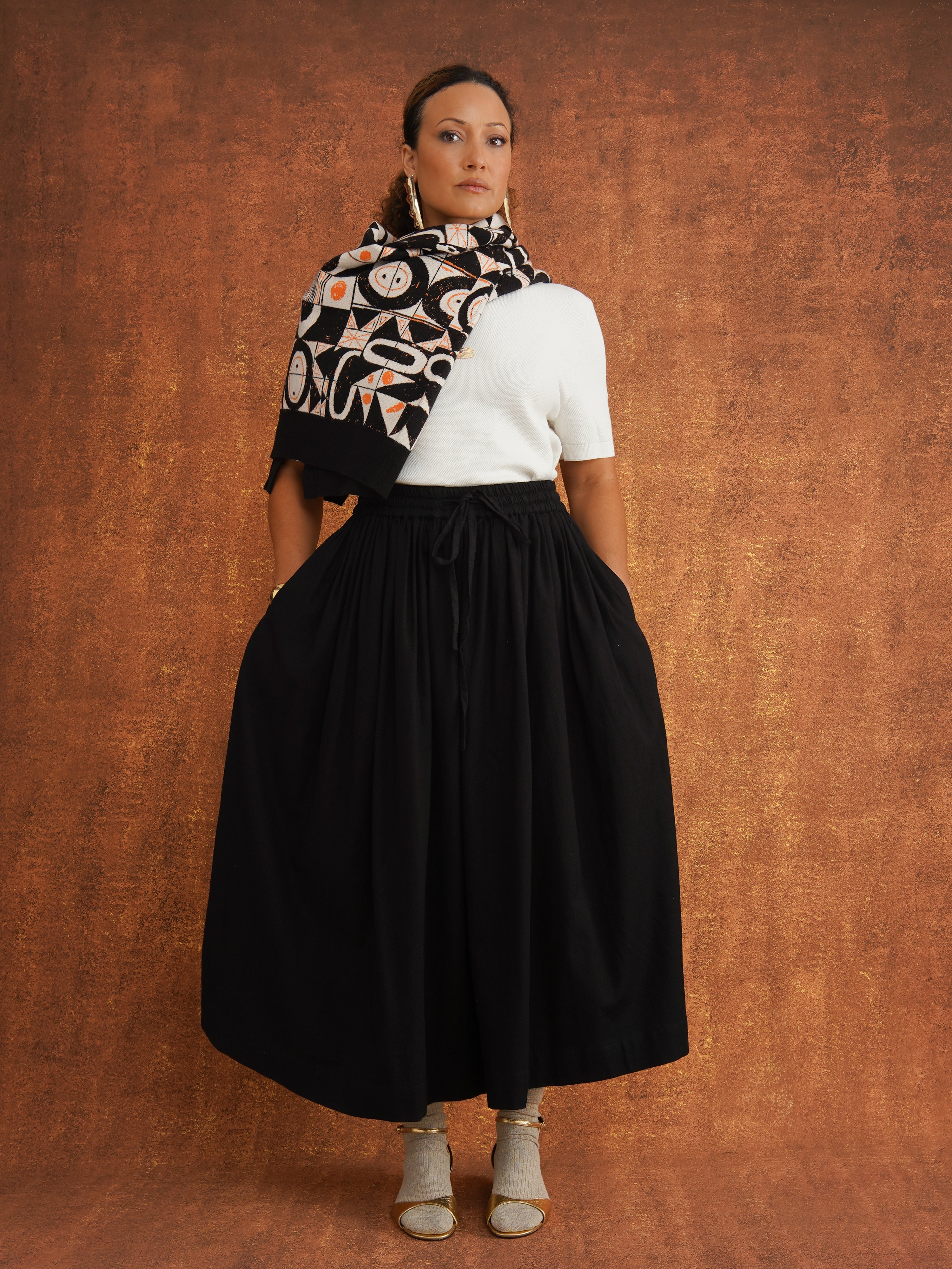 The Grand Skirt in Black, gathered midi skirt in textured dobby cotton with elasticated drawstring waist