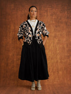 The Grand Skirt in Black, gathered midi skirt in textured dobby cotton with elasticated drawstring waist