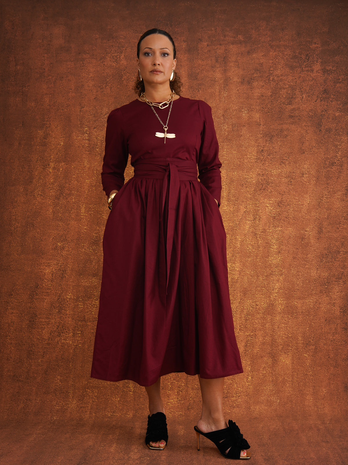 The Amina Dress Heavy Dobby Edition in Burgundy, styled shot