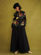 Ariya Adaze Shirt, a fitted shirt in red and yellow Fireworks print Dutch wax cotton on a blue background